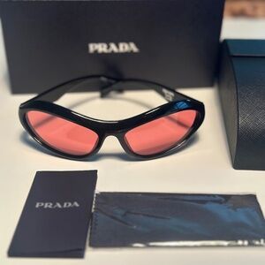 Prada Black Frame Sunglasses with Pink Lenses